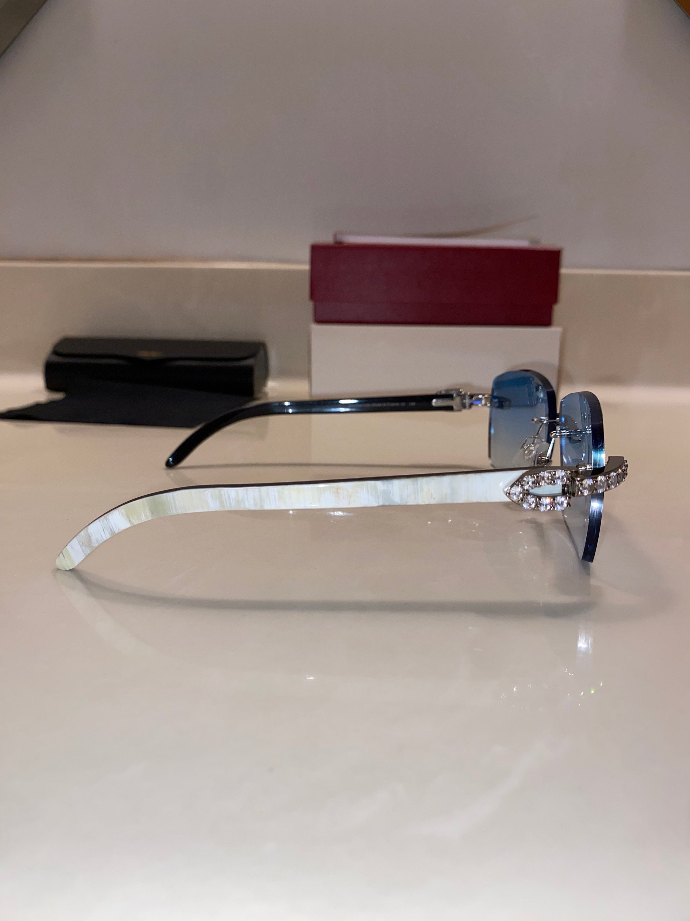 White Iced Buffs Blue Lens Silver Frame