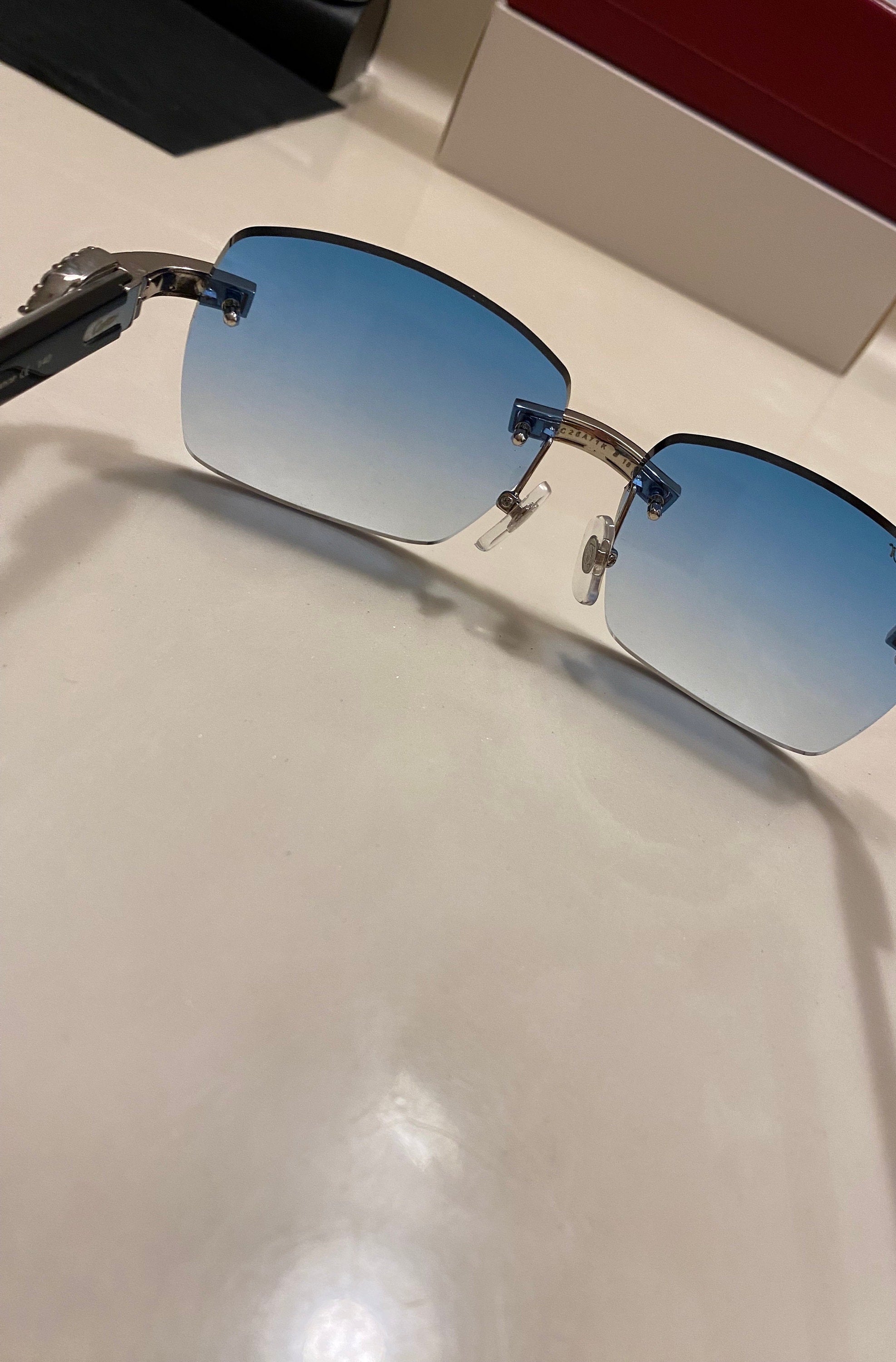 White Iced Buffs Blue Lens Silver Frame